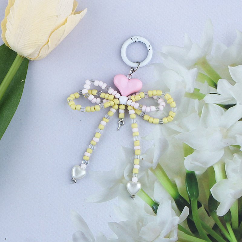 Factory wholesale acrylic keychain cute bow keychain beading mobile phone case charm accessories