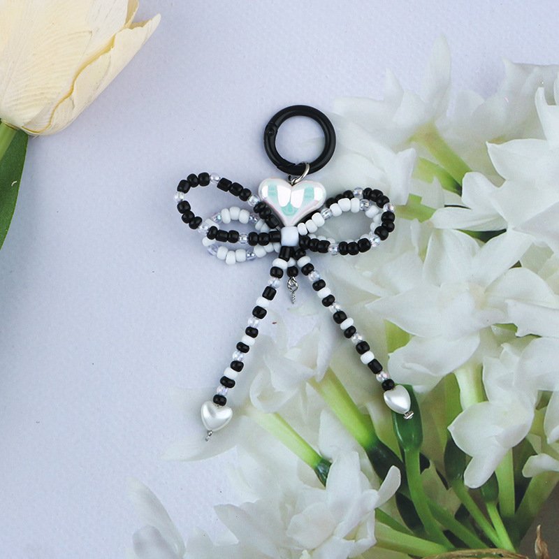 Factory wholesale acrylic keychain cute bow keychain beading mobile phone case charm accessories