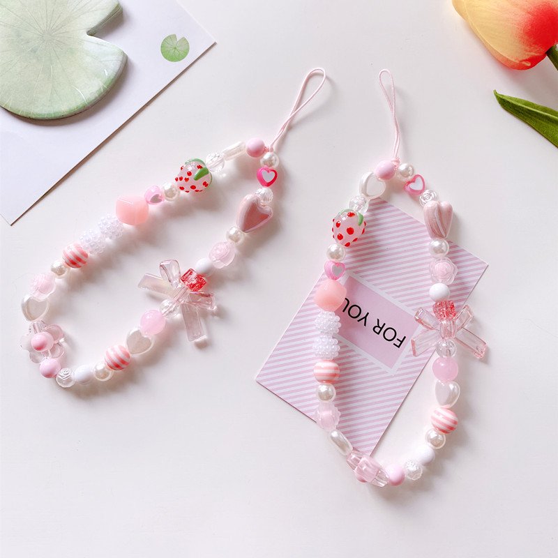 Korean women's handmade Strip crystal bow tie strawberry pink phone chain bead bracelet