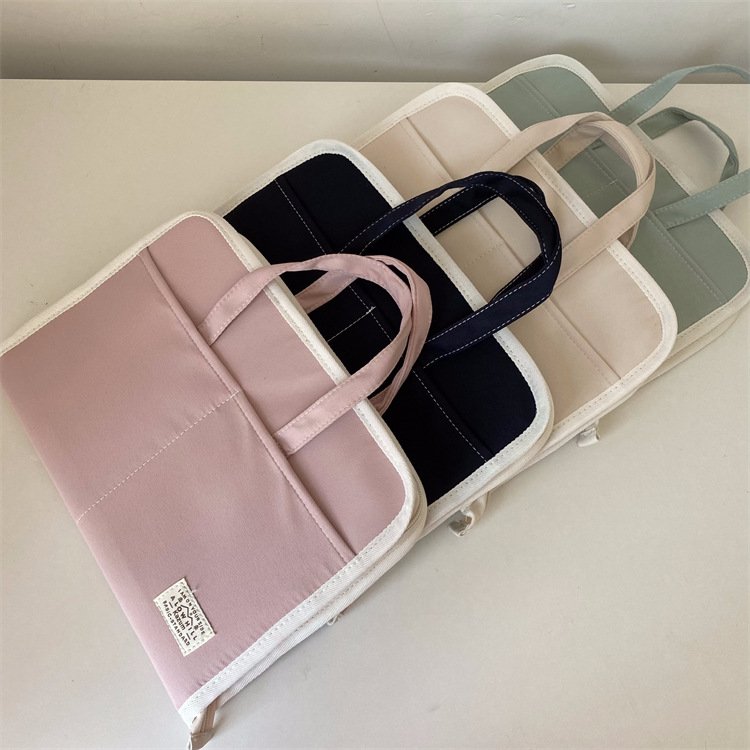 Korean simple commuting men and women portable book stationery storage bag 11-inch tablet computer keyboard shockproof bag
