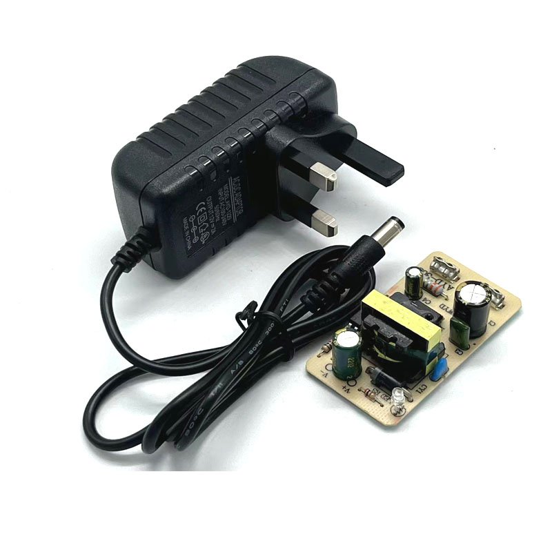 Factory price 12v2a UK plug switching power supply adapter 12v2000ma ac to dc adapter power for LED CCTV support customized