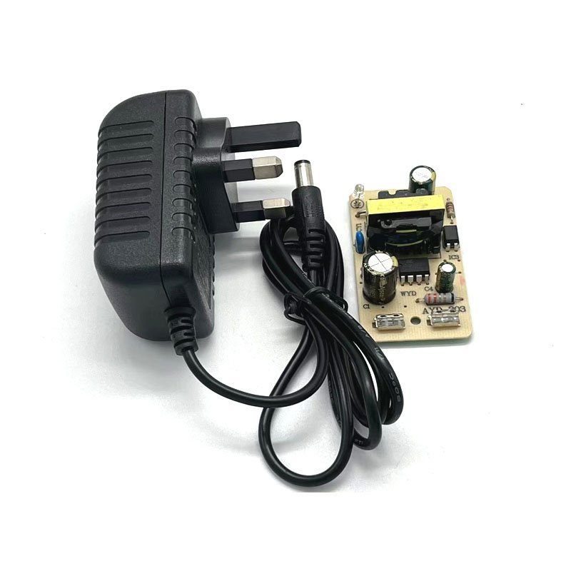 Factory price 12v2a UK plug switching power supply adapter 12v2000ma ac to dc adapter power for LED CCTV support customized