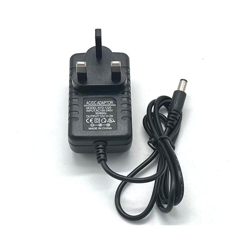 Factory price 12v2a UK plug switching power supply adapter 12v2000ma ac to dc adapter power for LED CCTV support customized
