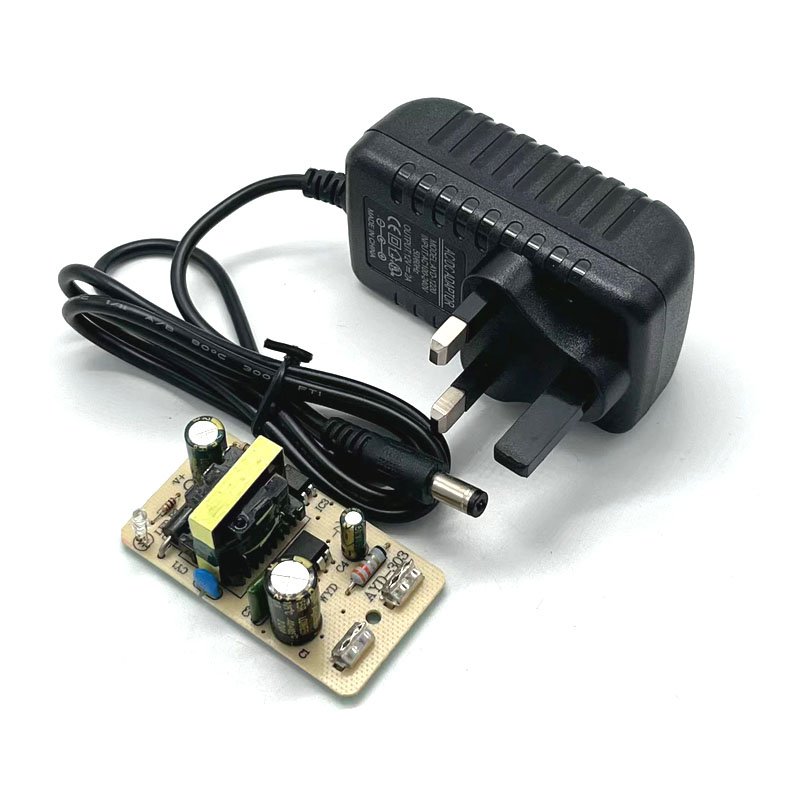 Factory price 12v2a UK plug switching power supply adapter 12v2000ma ac to dc adapter power for LED CCTV support customized