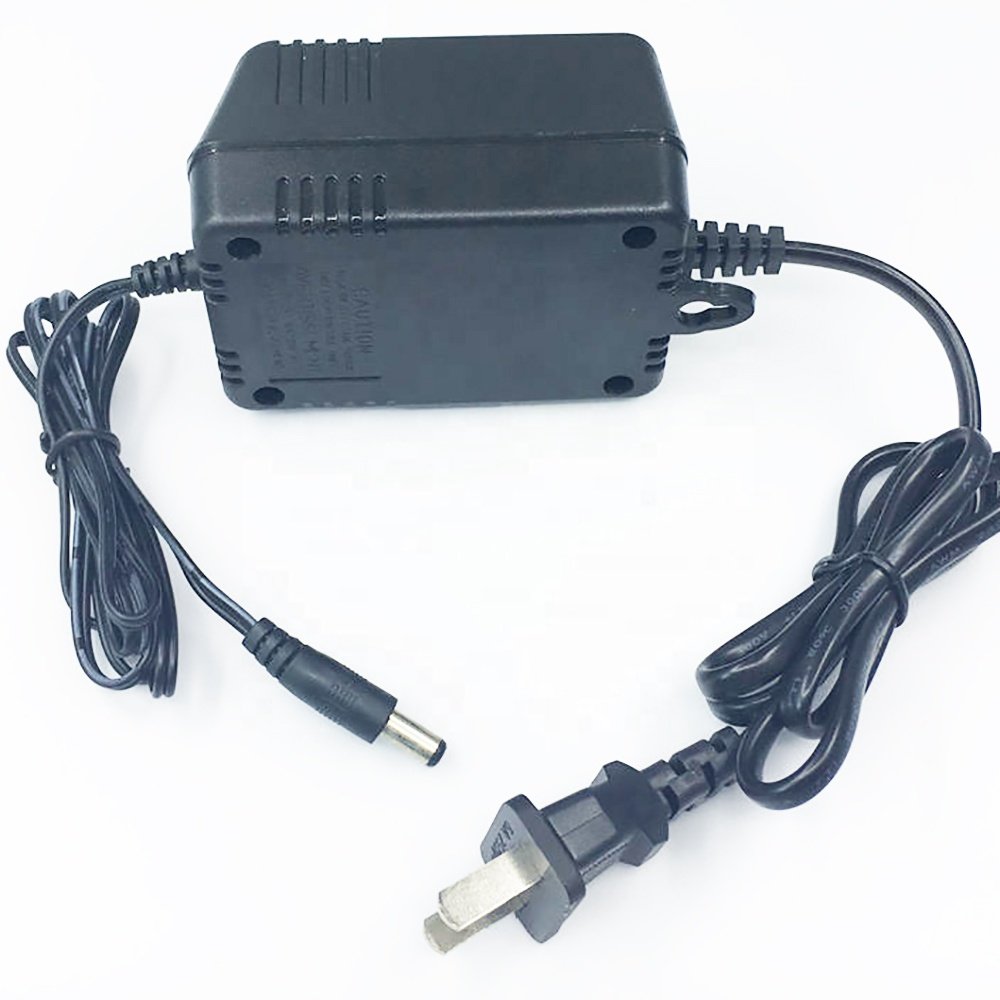 AC-AC transformer with US plug Input is 120V 60Hz. Out put is 15V AC 2000 mA Linear power adapter