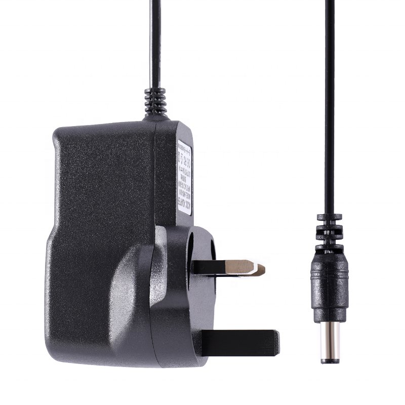 Manufacturer Direct 9V1A US EU UK power adapter 9V1A switch mode power supply AC DC plug adapter