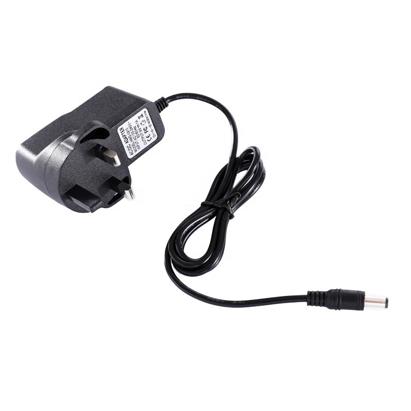 Manufacturer Direct 9V1A US EU UK power adapter 9V1A switch mode power supply AC DC plug adapter