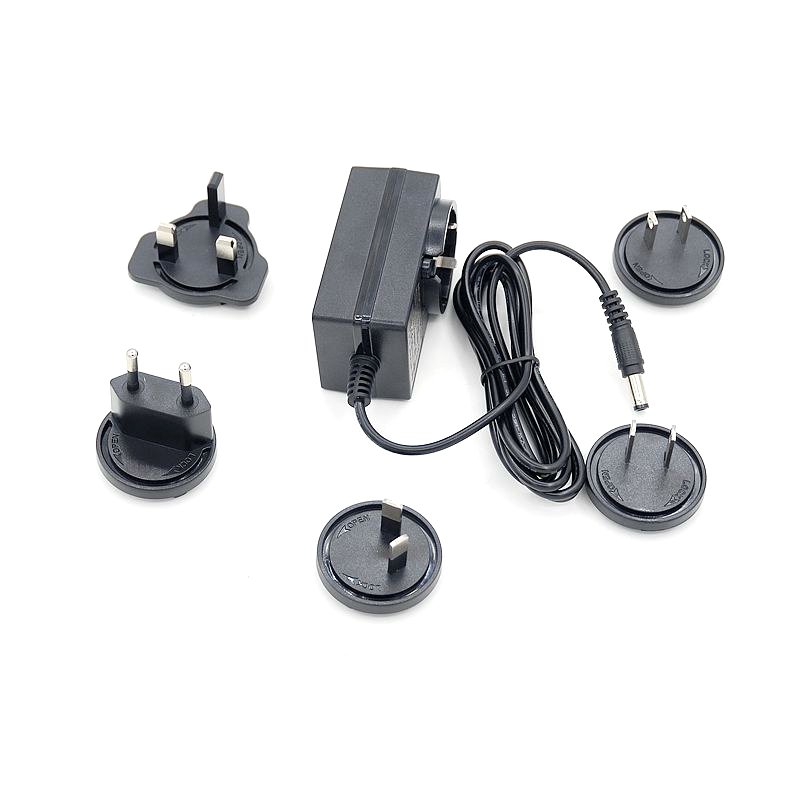 12VDC 1A 12W interchangeable plug power mains ac adapter charger with EU UK US AU plug