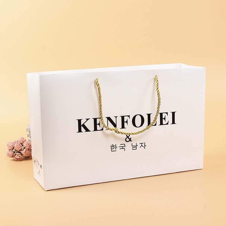 Luxury paper gift bags manufacturer shopping paper bag with handles logo gift bag packaging for clothing