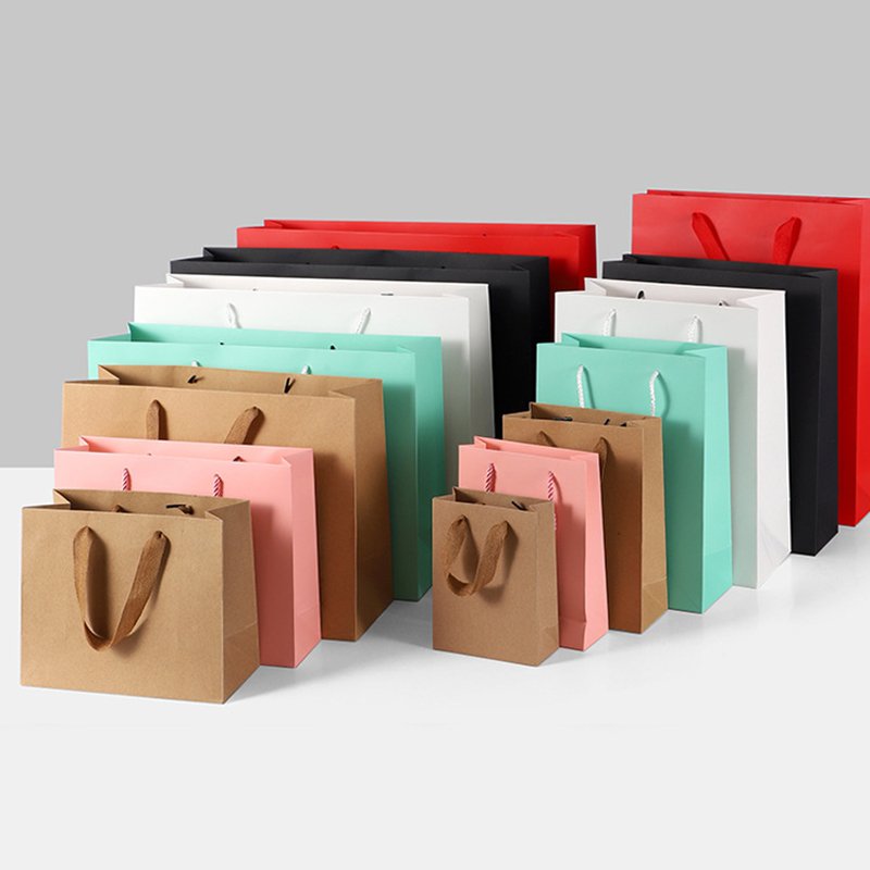Wholesale Custom Logo Kraft Brown Paper Flower Packaging Shopping Clothes Small Gift Bag With Handles