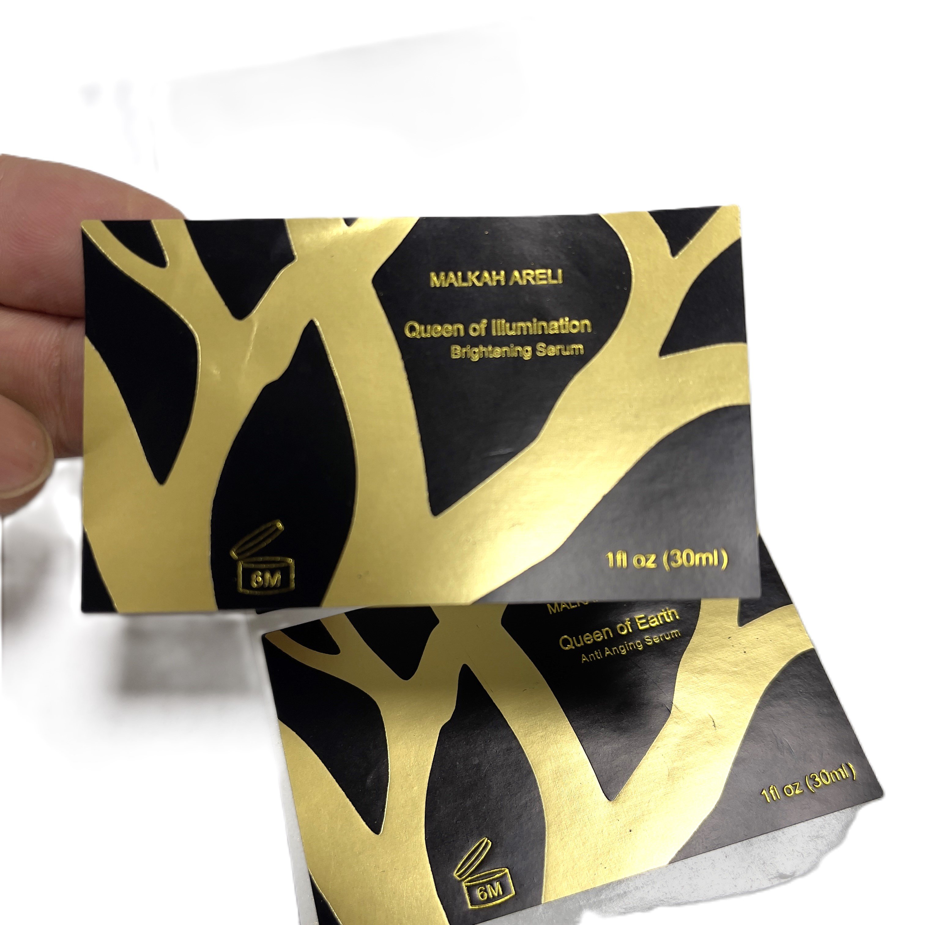 Customized cosmetics packaging labels with gold and silver stickers