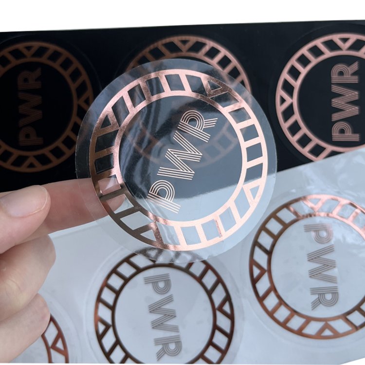 Cheap Custom Brand Name Logo Metallic Foil Rose Gold Pvc Clear Transparent Label Sticker Round Logo Sticker Manufacturer