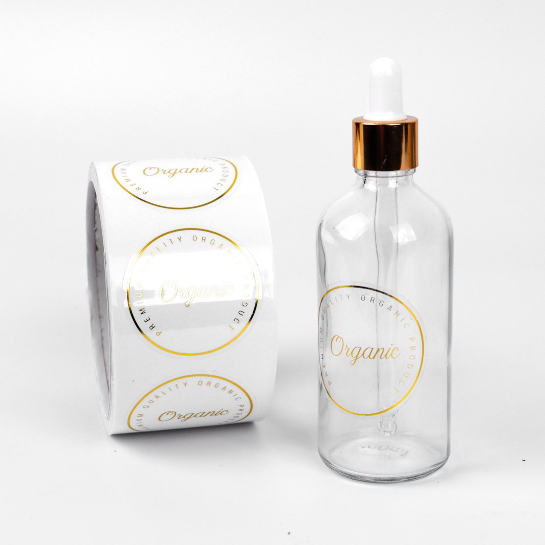 Custom printing waterproof vinyl cosmetic logo sticker transparent gold foil sticker clear perfume sticker roll bottle label