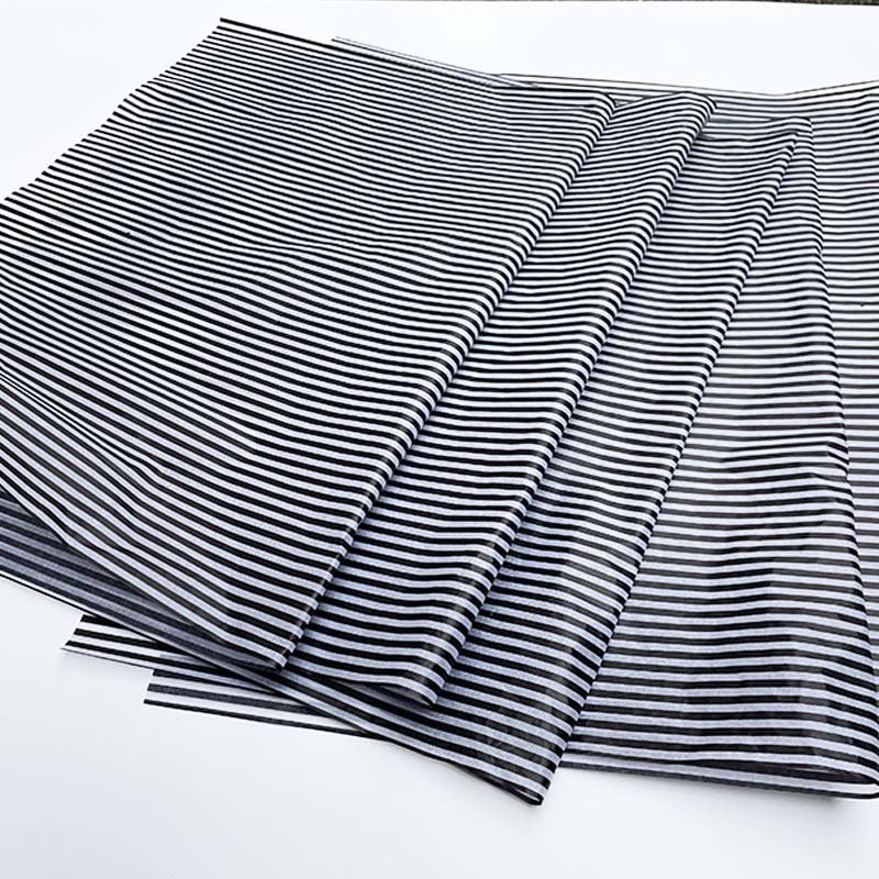 customised black and white striped tissue paper and stickers