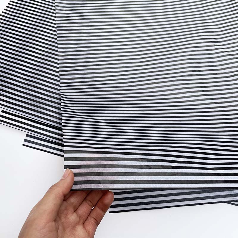 customised black and white striped tissue paper and stickers