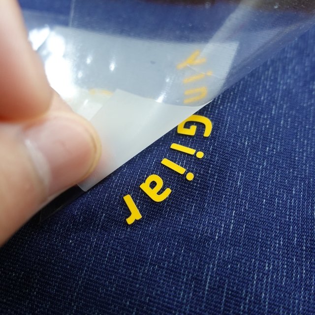 Custom transfer decals on clothing are used in plastisol transfer custom factories for T-shirts