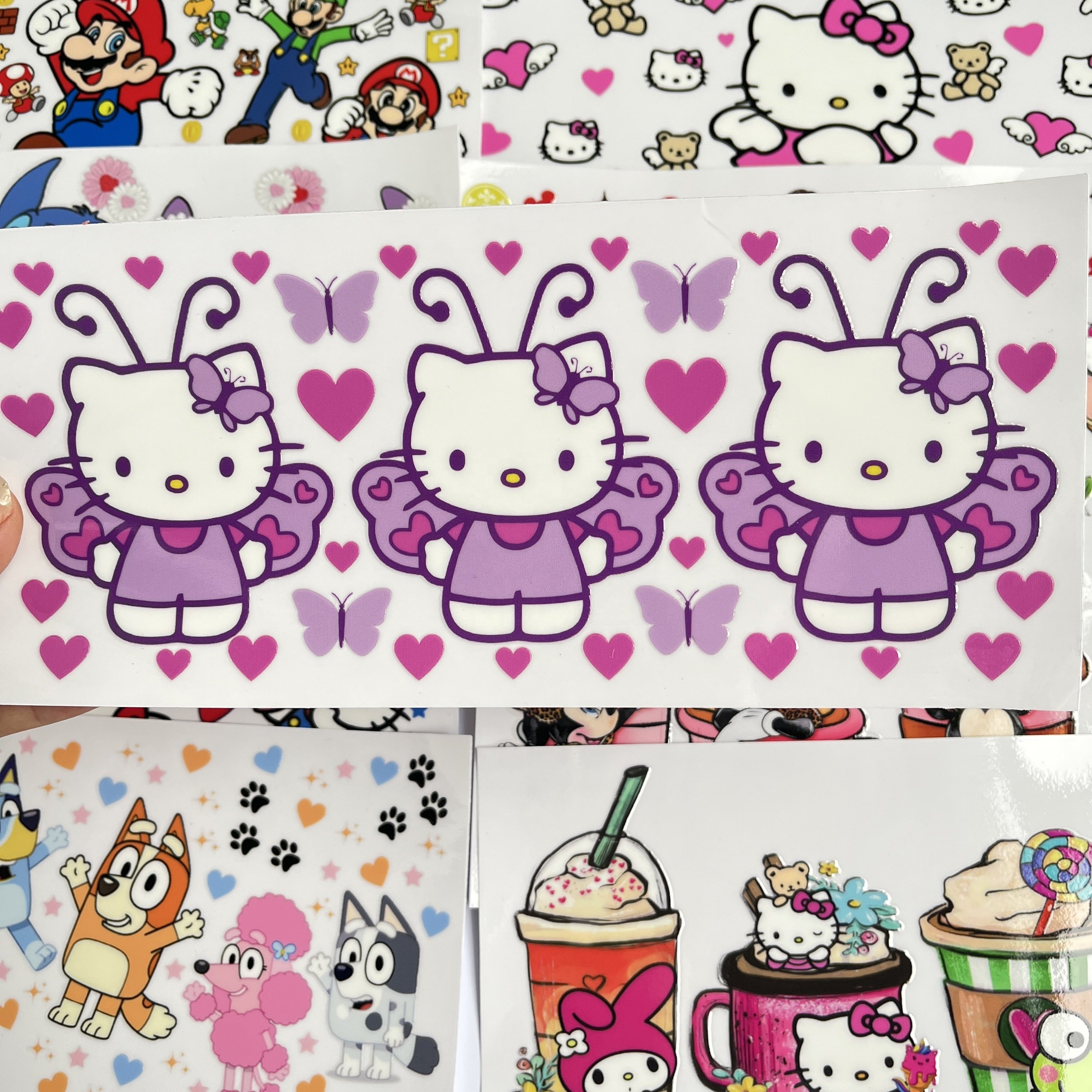 Wholesale factory cartoon labels heat transfer film printed on glass vinyl sticker printing uv dtf wraps 16oz for cups