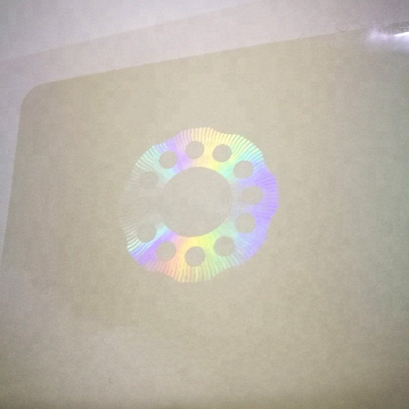 Transparent laminated hologram overlay label sticker