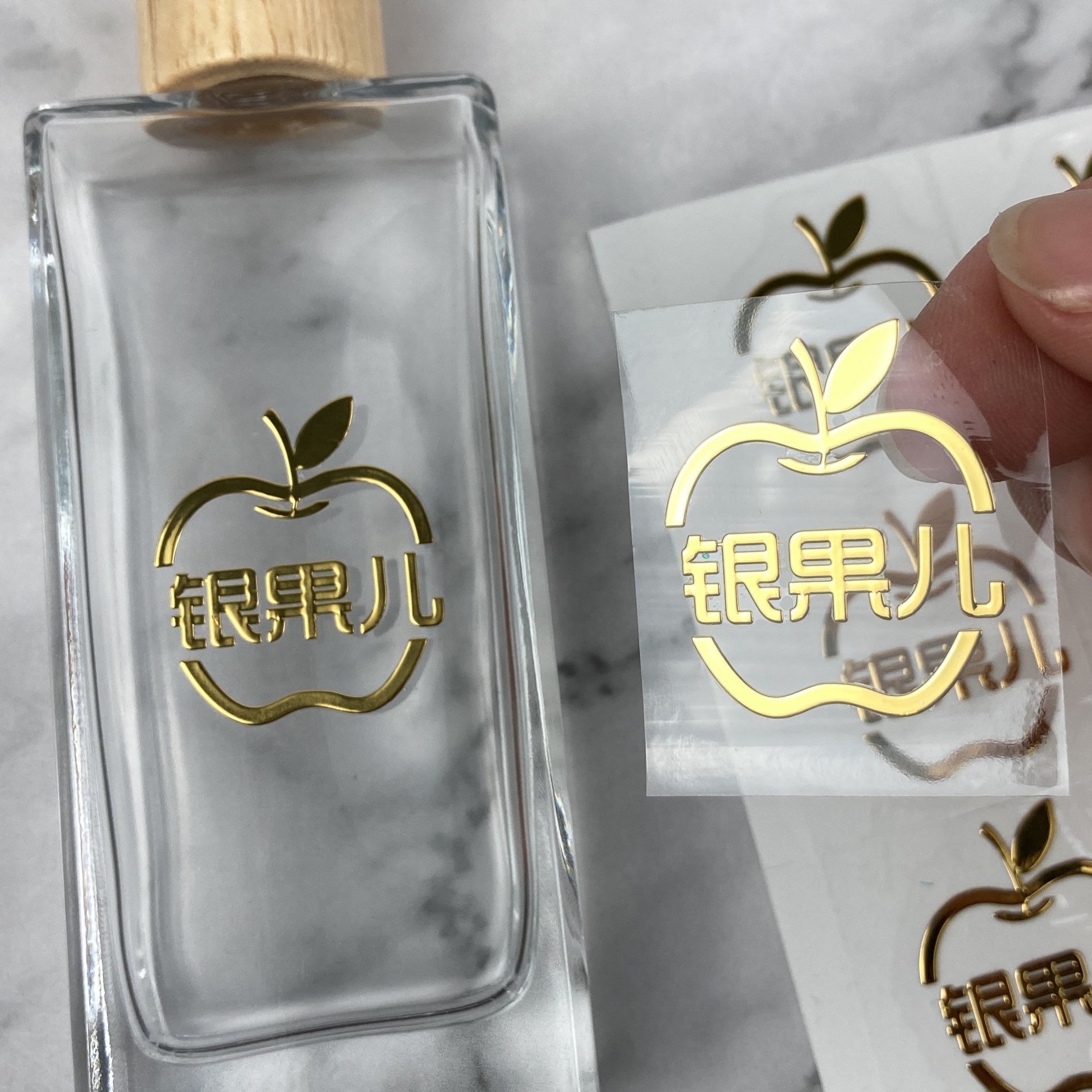Custom Waterproof Clear Vinyl Stickers Logo Printing Adhesive Cosmetic Packaging Glass Perfume UV Transfer Stickers Label