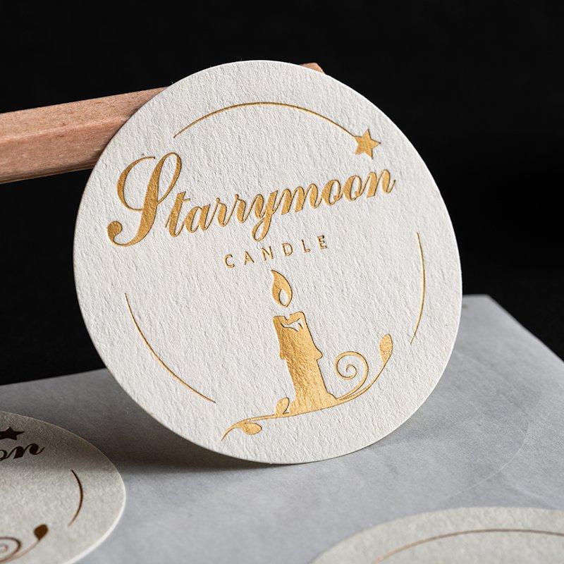 Factory direct custom label texture paper gold foil embossed stickers custom