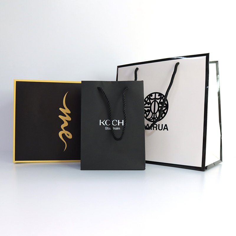 Custom Printed Pretty 250gsm Black Mixed Gold Color Coated Paper Gift Bag for Shopping