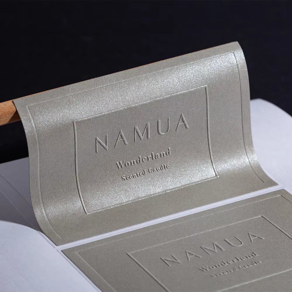 Custom the special texture paper 3D embossed black self adhesive stickers matte packaging labels