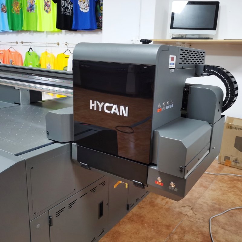 Guangzhou manufacturer 60cm print width UV flatbed printer for bottle pen printing 6090 uv flatbed medal foam board pvc poster