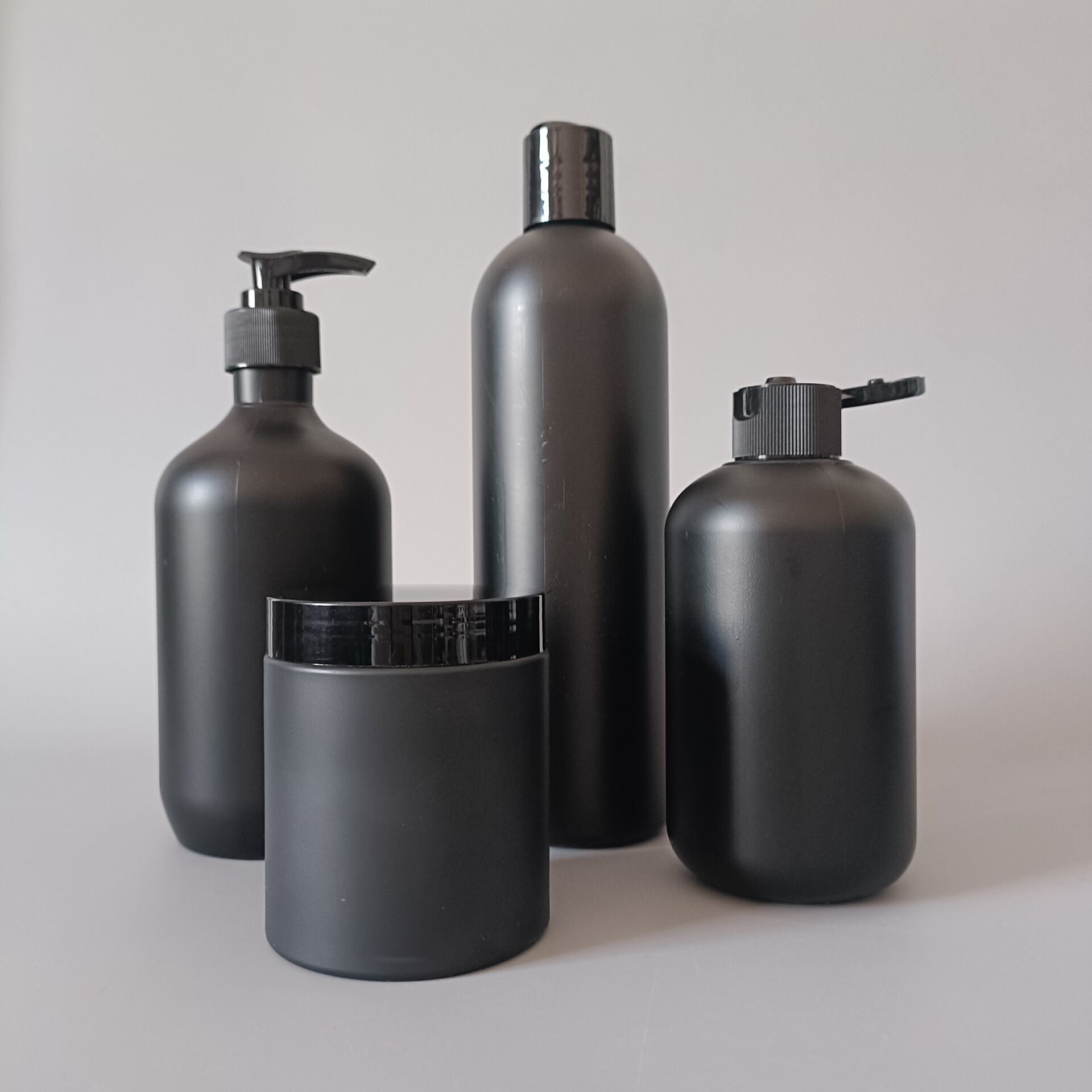 Luxury customize logo matt black plastic men's Skincare Cosmetic Lotion shampoo hair oil face cream packing Bottles And Jar Set