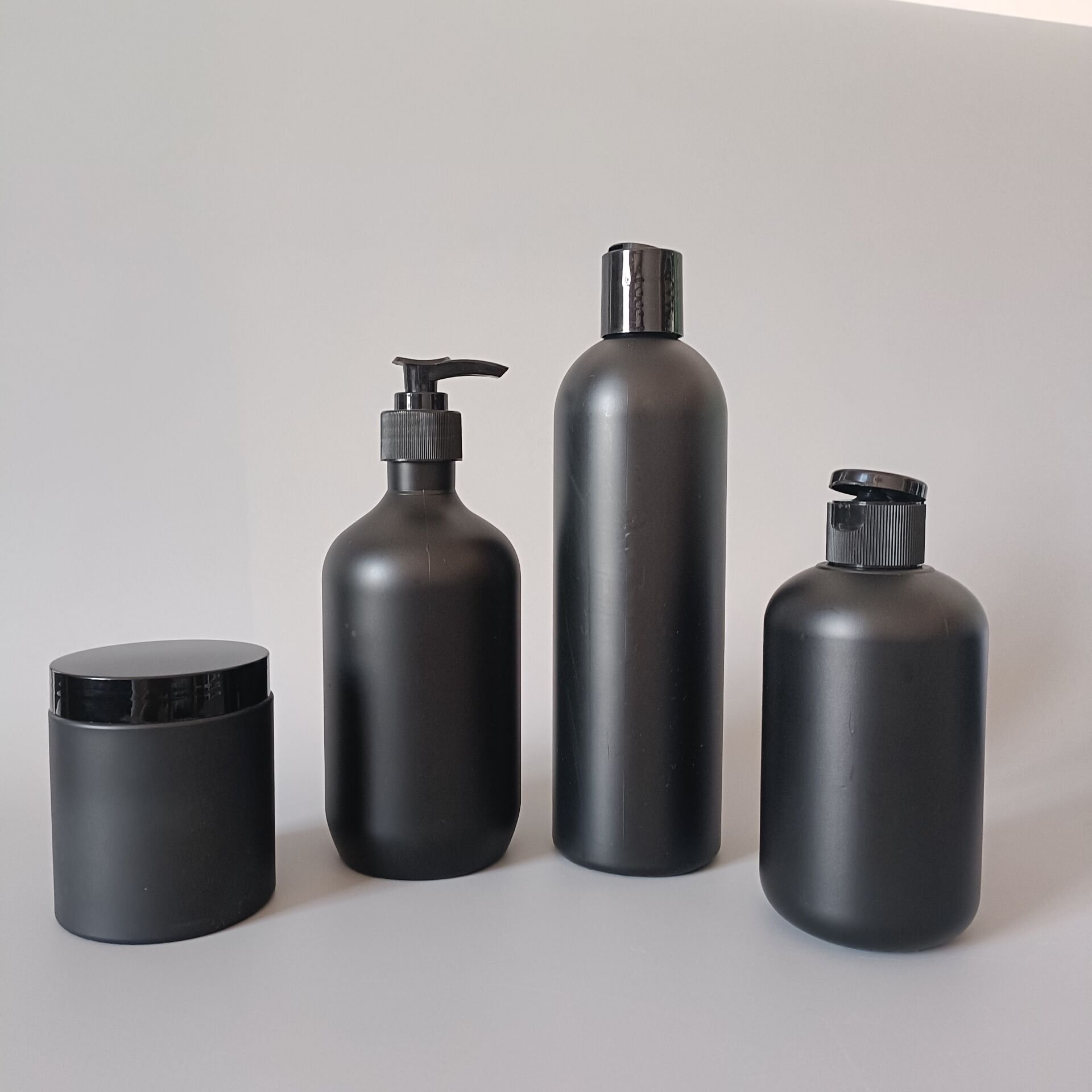 Luxury customize logo matt black plastic men's Skincare Cosmetic Lotion shampoo hair oil face cream packing Bottles And Jar Set