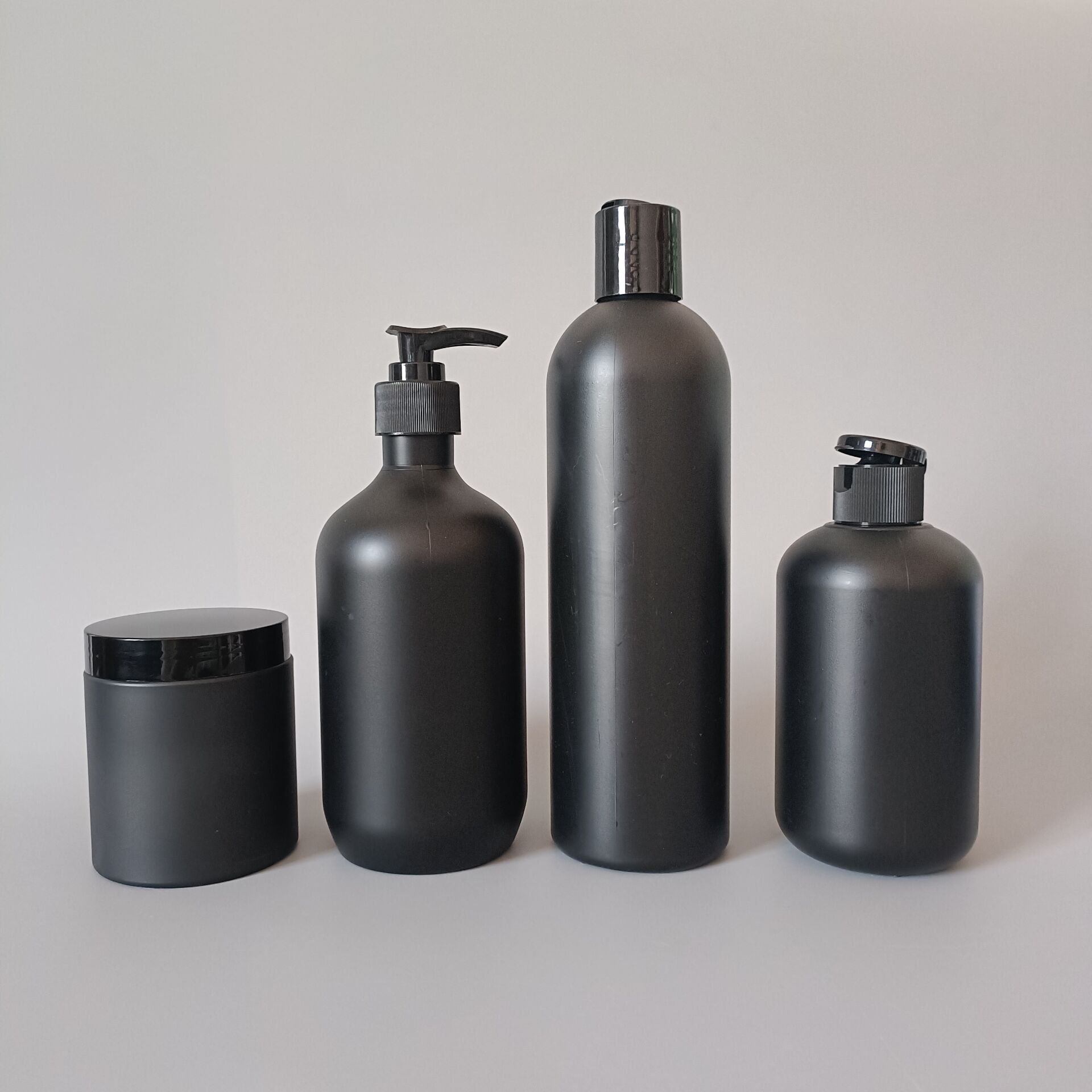 Luxury customize logo matt black plastic men's Skincare Cosmetic Lotion shampoo hair oil face cream packing Bottles And Jar Set