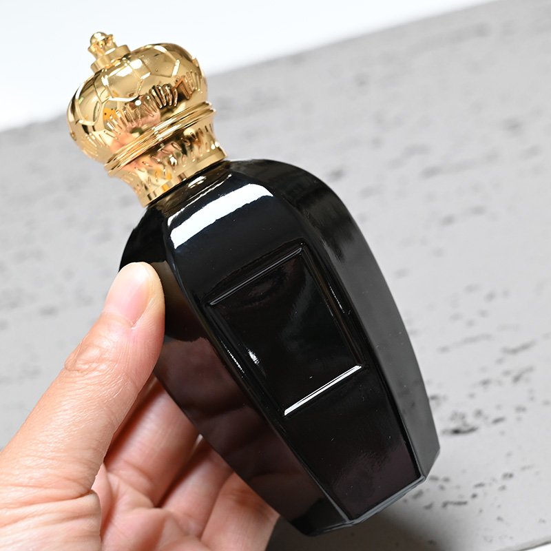 Luxury matte black shining black spray crimp empty 50ml glass perfume bottle with gold zamac cap