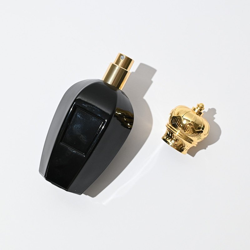 Luxury matte black shining black spray crimp empty 50ml glass perfume bottle with gold zamac cap