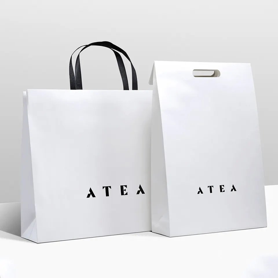 Branded Custom Logo Luxury White Art Paper Bag Apparel Shopping Gift Bag For Clothes