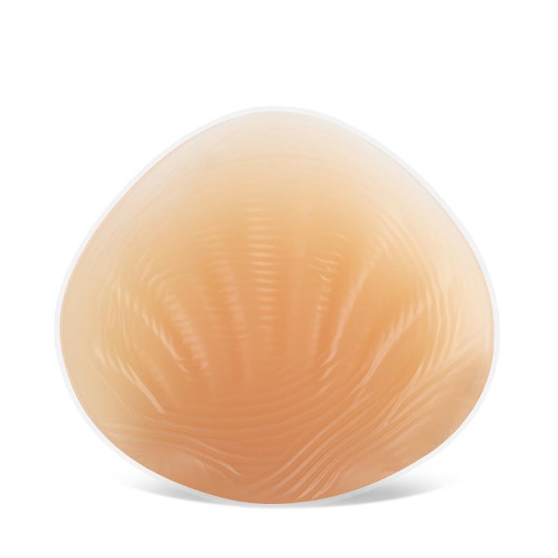 The triangular concave bottom silicone breast shape is suitable for women with large breasts after mild mastectomy.