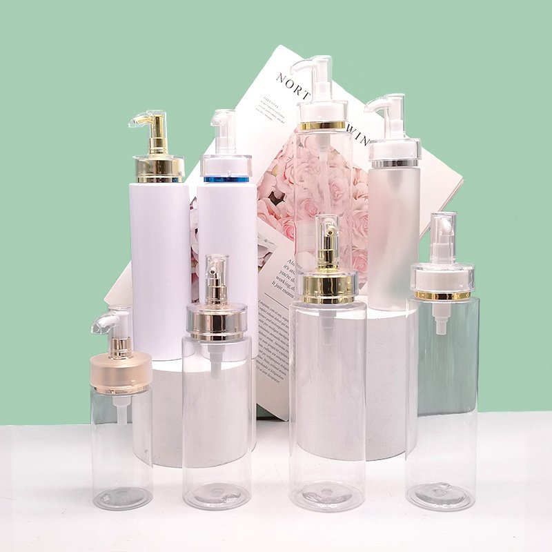 Low MOQ 100ML 200ML 300ML 500ML Deluxe PET refillable Plastic container with gold pump head shampoo shower gel Body oil bottle