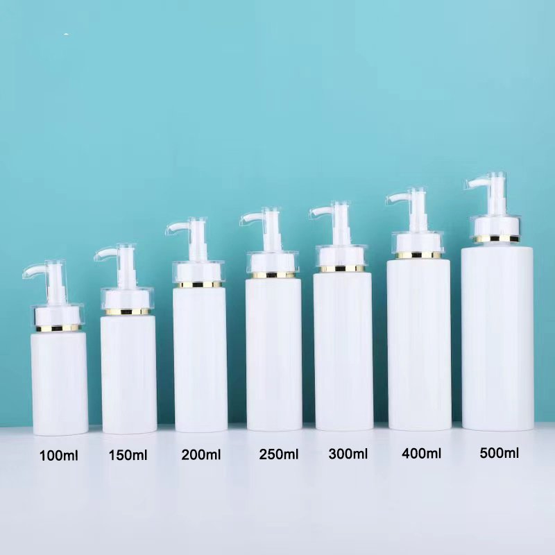 Low MOQ 100ML 200ML 300ML 500ML Deluxe PET refillable Plastic container with gold pump head shampoo shower gel Body oil bottle