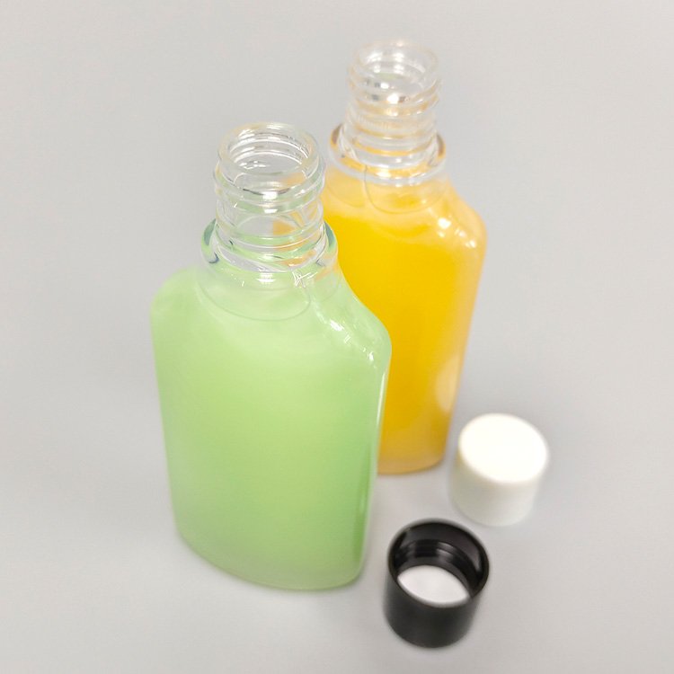 30ml Travel-sized food grade refilled flat shape PET plastic transparent hand sanitizer bottle with lid