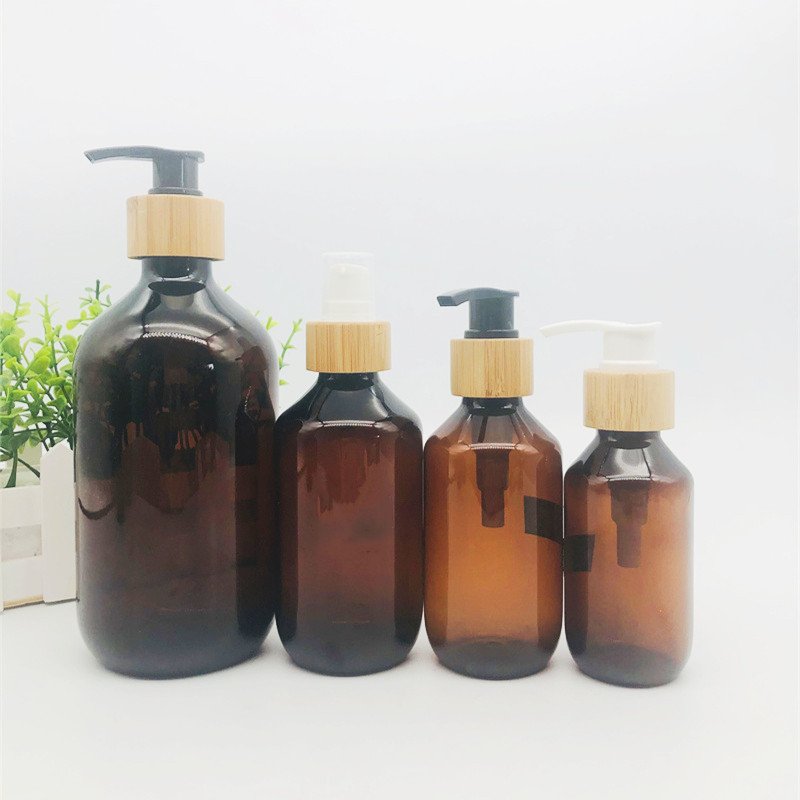 Factory Empty Shampoo Bottles 100ml 200ml 300ml 500ml Pet Plastic Amber Round Shower Gel Bottles With Lotion Pump