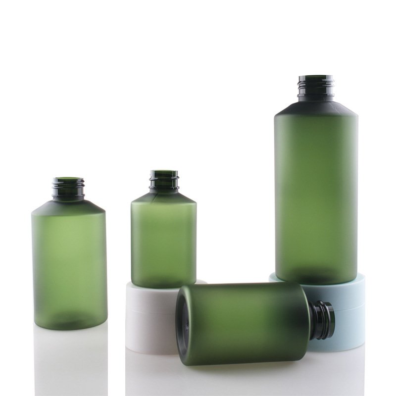 Oblique Shoulder frosted green toner 100ml pet plastic bottle 300ml 500ml green shampoo bottle lotion pump shower gel dispenser