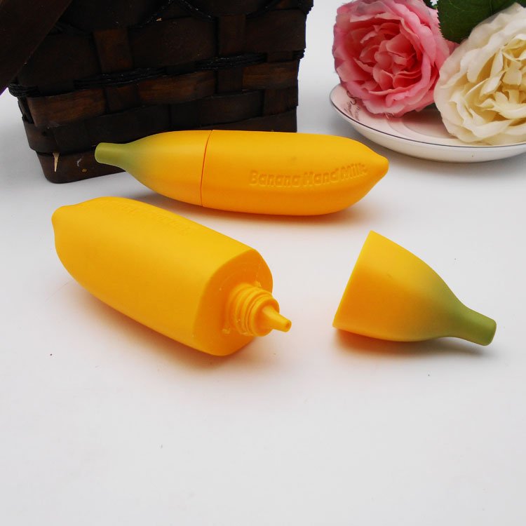Customized logo portable packing natural ingrdients banana shaped kids body lotion
