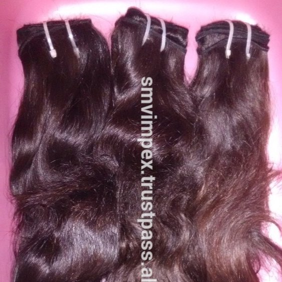 Natural hair weaving. wavy human hair wafting from india