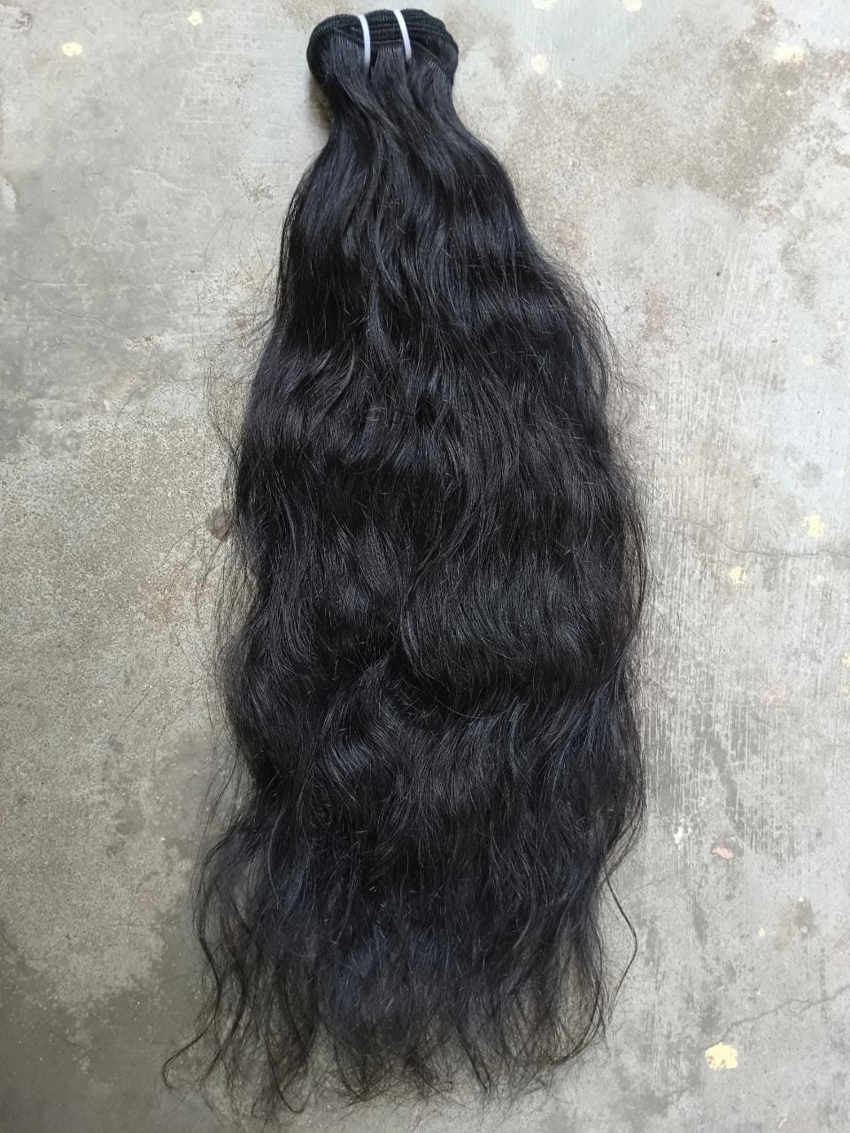 TOP QUALITY RAW UNPROCESSED INDIAN TEMPLE REMY HUMAN HAIR EXTENSIONS FROM INDIA FACTORY. ALL CUTICLE IN SAME DIRECTION