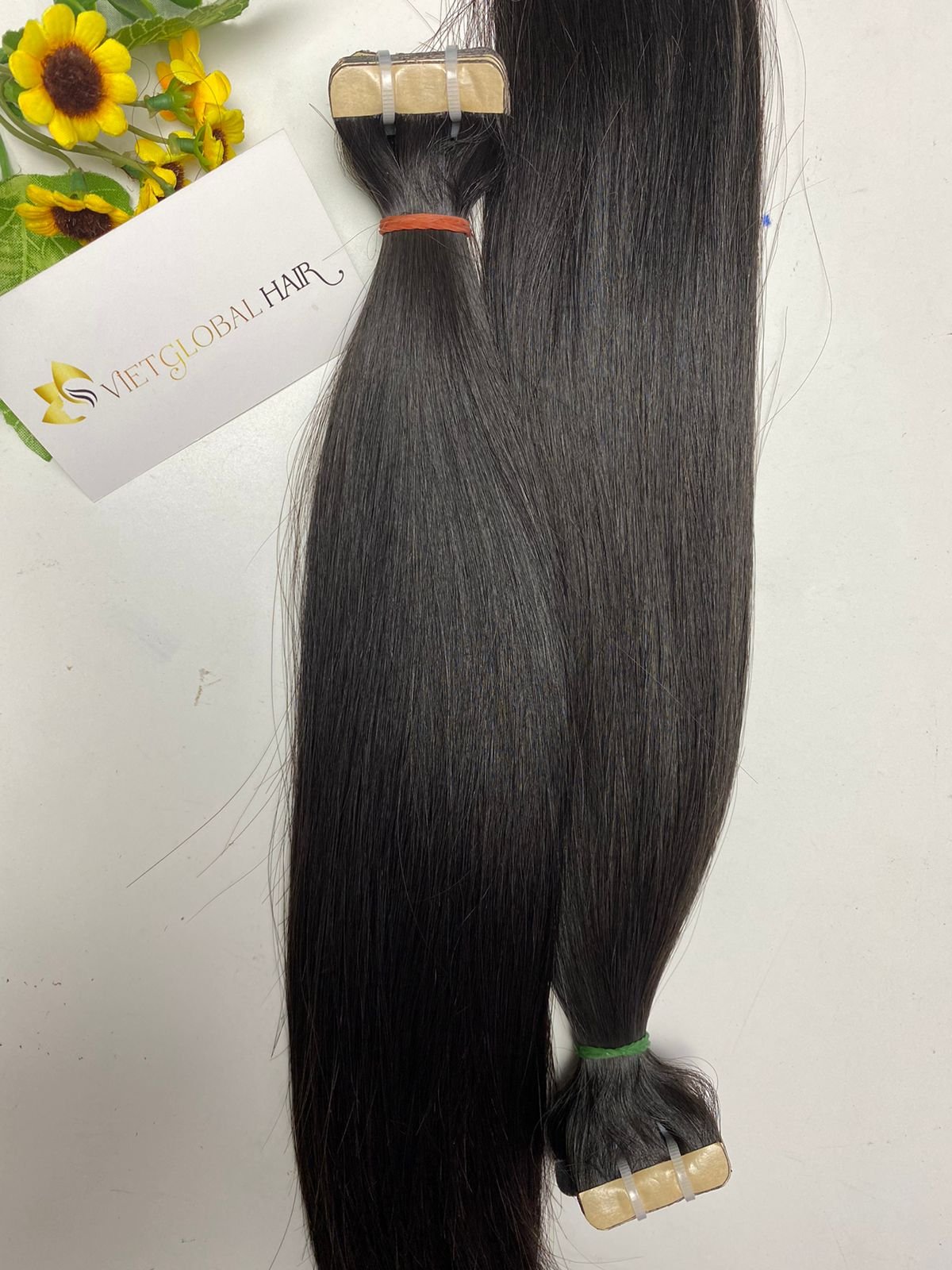 Natural Straight Tape In 100% Raw Vietnamese Human Hair Extension High Quality No Shedding, No Tangle, No Animal Hair.