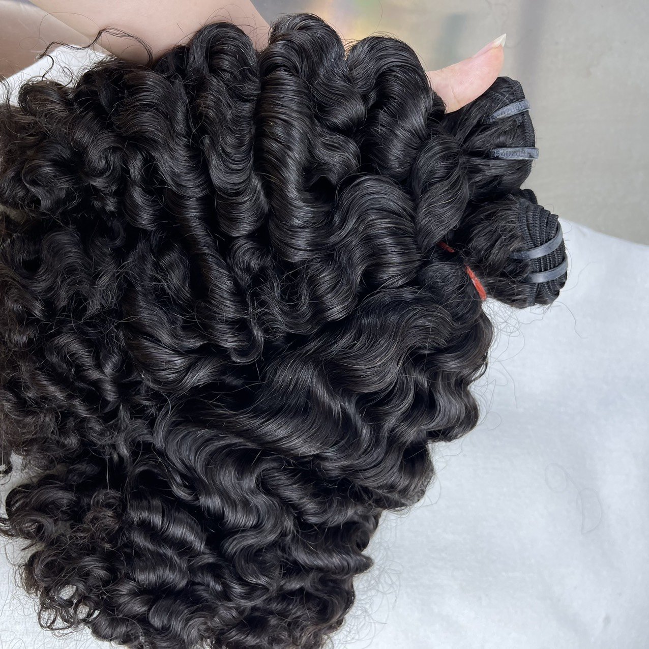 Top Selling Vietnamese Burmese Curly Hair Bundles 100% Raw Steam Curly Weaves Bundles Wefted Hair Soft And Silky Hair Suppliers