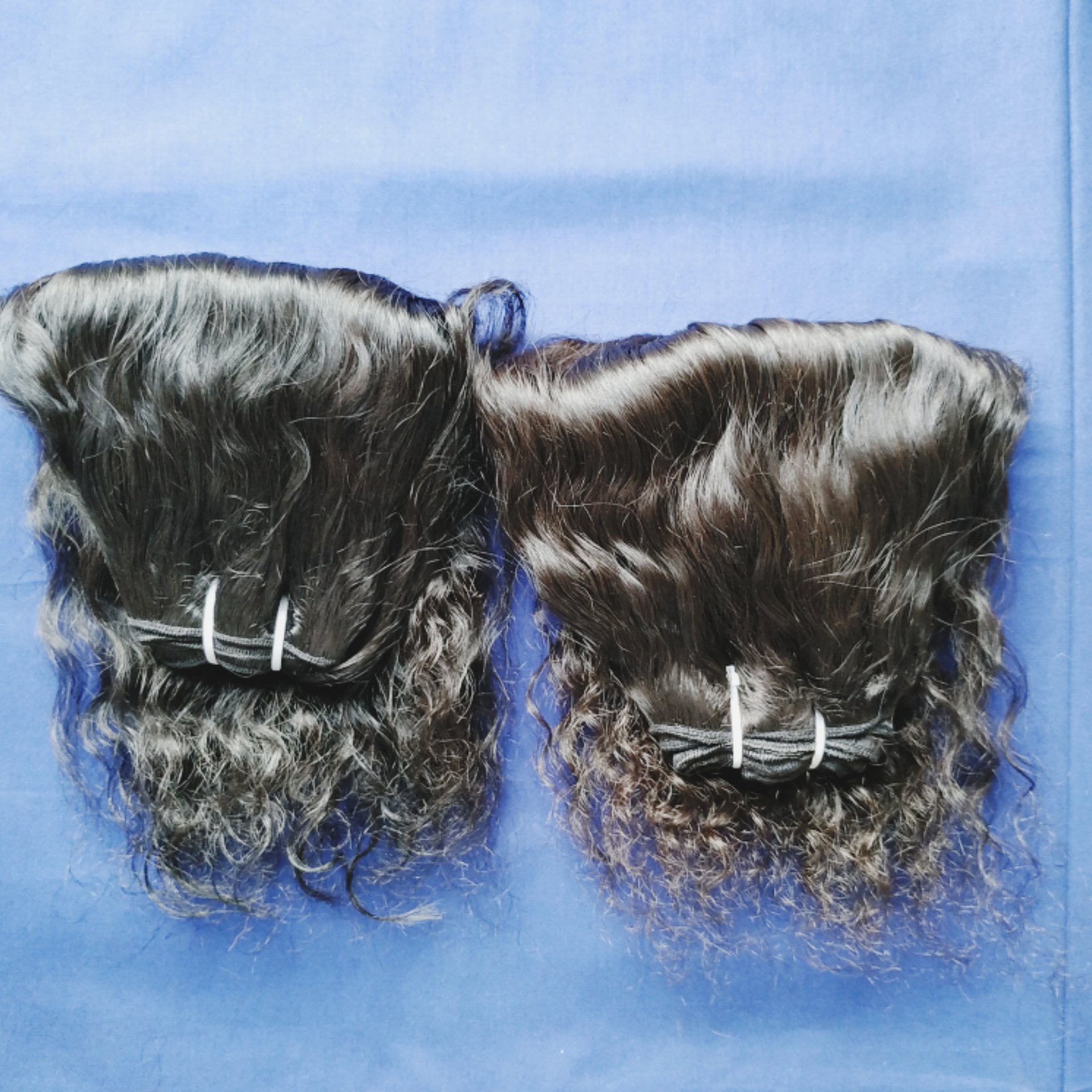 Wholesale cheap Price 100% Raw Unprocessed Natural Genius Weft Black Wavy Indian Temple Indian Human Hair Extensions