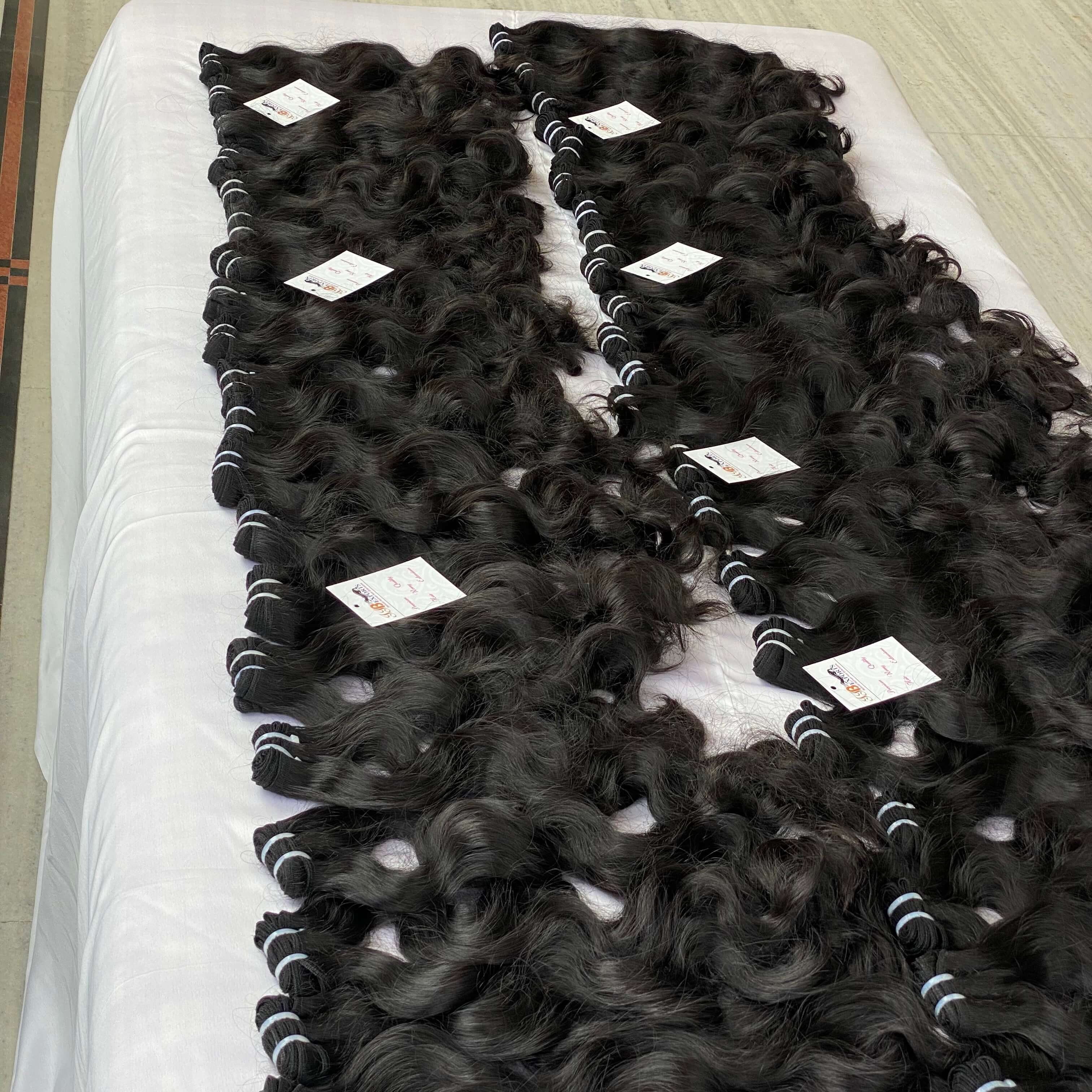Factory wholesale price raw indian hair bundle,100% human hair extensions,raw hair vendors natural wave virgin indian hair
