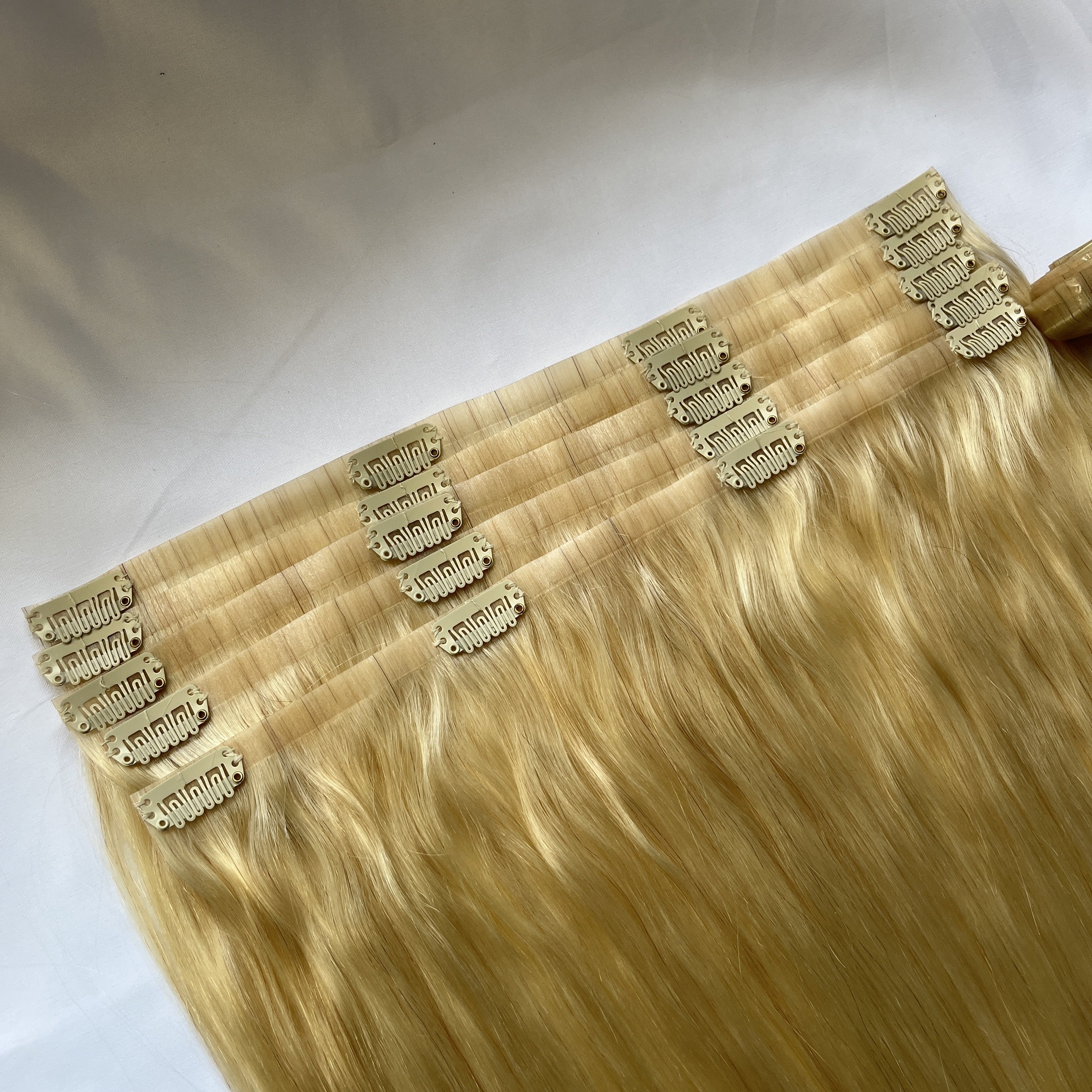 Drop shipping pu skin clip in hair extension raw remy hair blonde color seamless clip in extension