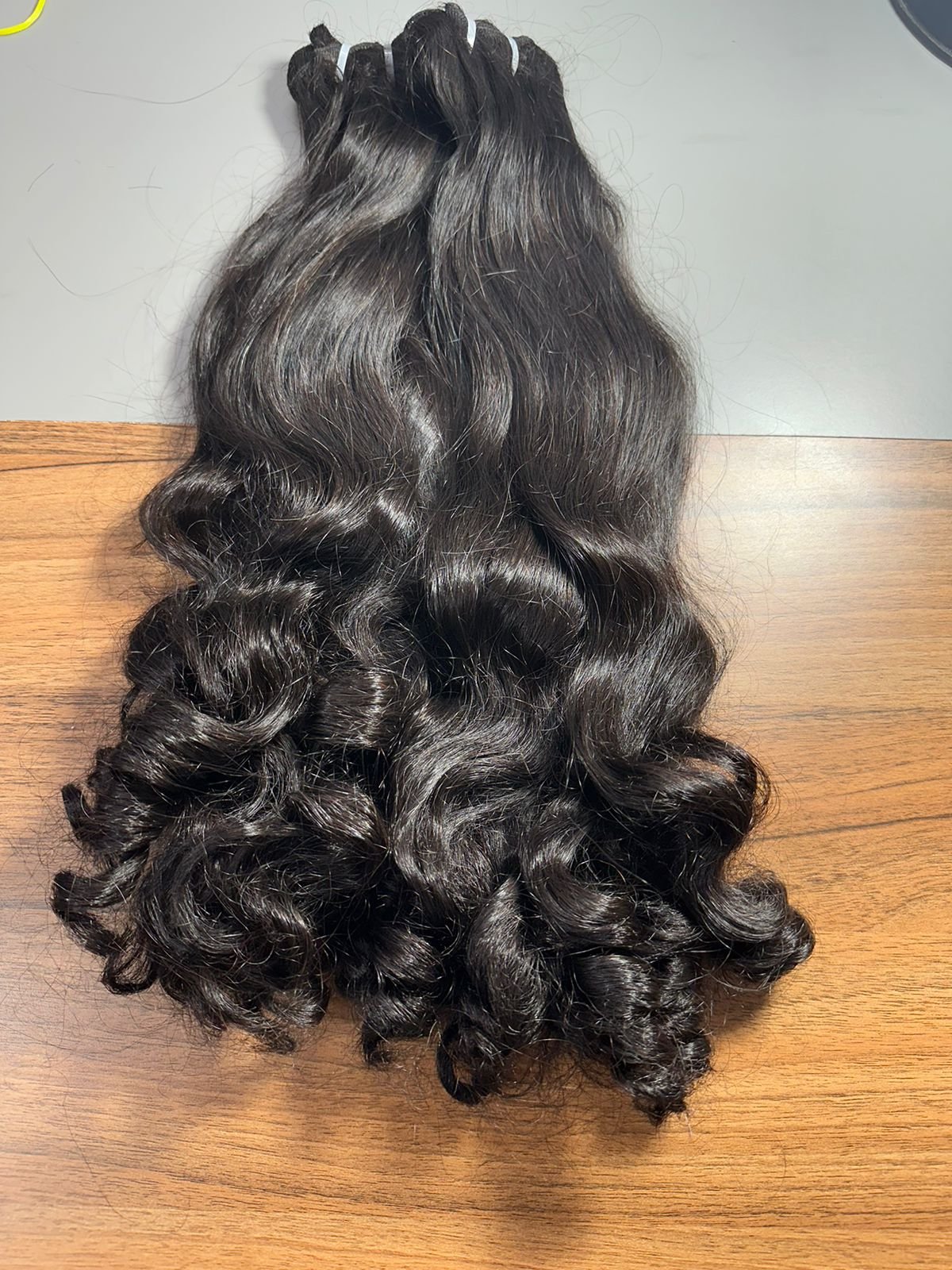 Lowest Prices Raw Bouncy Curly Human Hair with Soft Texture Virgin Human Hair Extension For Sale By Indian Exporters