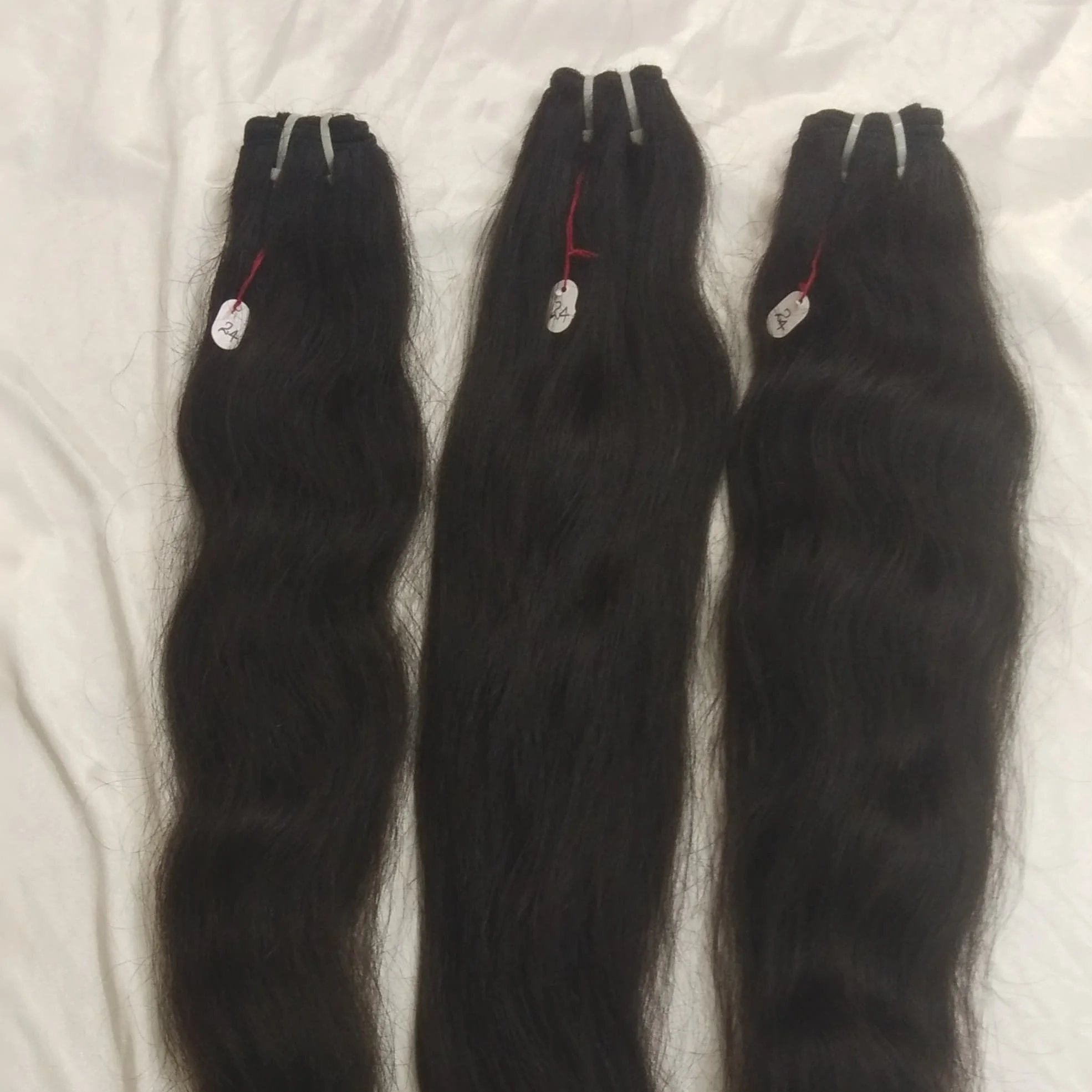 100% Shedding free temple human hair weaving from india. raw hairs