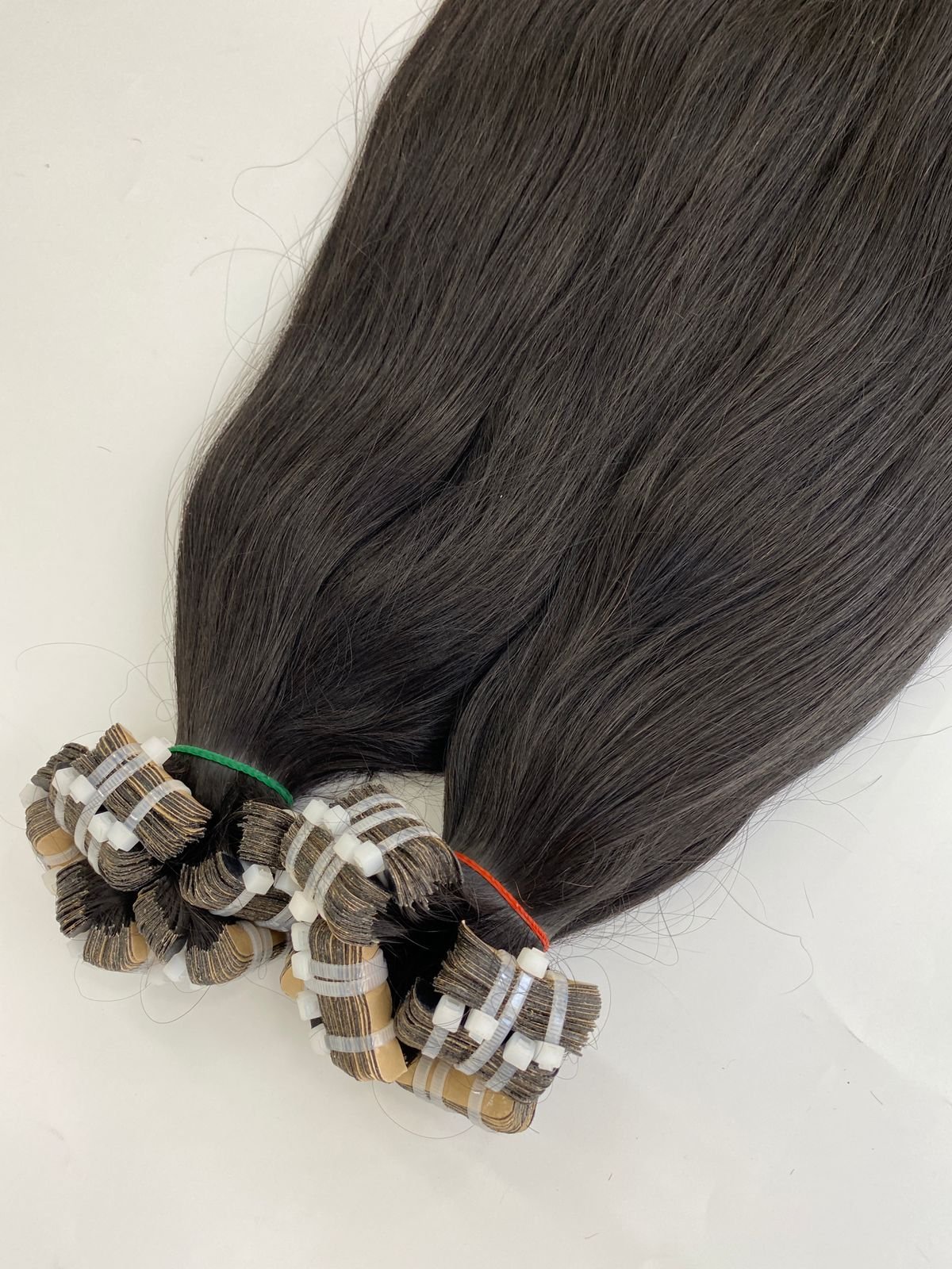 Factory direct price double drawn hair plastic tape in keratin nano hair extensions tape in hair extensions. smooth and silky